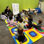 Group circle time learning activity at San Leandro, California preschool