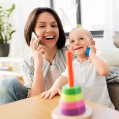 Mother on phone with East Bay Child Development Center