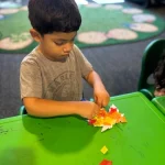 Toddler paper craft activity at East Bay, California preschool